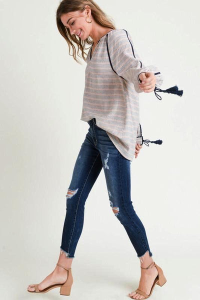 NAVY STRIPED V - NECK BLOUSE W/TASSEL CUFFS - The Pointe Boutique