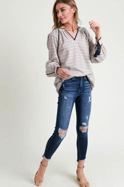 NAVY STRIPED V - NECK BLOUSE W/TASSEL CUFFS - The Pointe Boutique