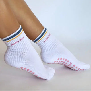 white striped grip socks with pink grips