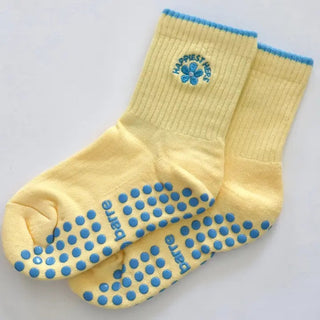 yellow grip socks with blue grips
