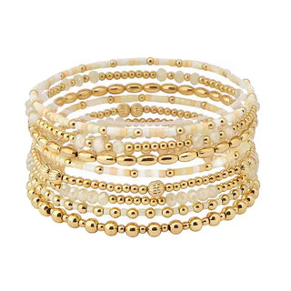 natural sead bead and gold beaded set of 9 stretch bracelet