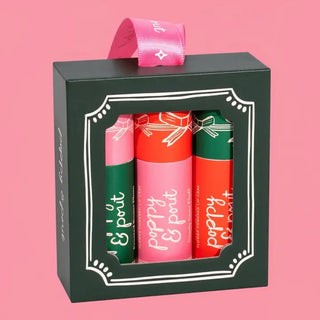 Holiday lip balm trio in a green ribbon ornament box