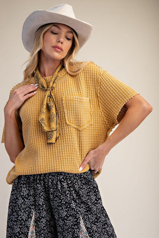 Collin Mustard Mineral Wash Top – mustard waffle-knit top with short sleeves and a chest pocket