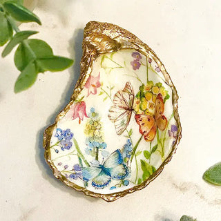 oyster shell trinket dish with butterflies and flowers and gold edge