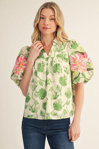 The Presleigh Top – black and cream floral print blouse with colorful embroidered sleeve, split neck, puff short sleeves
