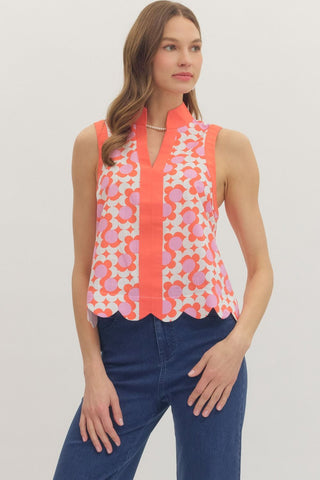 The Gracelyn Top – coral and pink geometric print sleeveless top, split V neck, scalloped hem