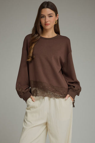The Emory Long Sleeve Lace Trim Top – black crew neck top with lace hem trim, balloon long sleeves