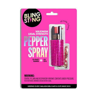 pink glitter pepper spray keychain in package