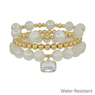 white beaded and gold set of 3 with square crystal charm stretch bracelet water resistant