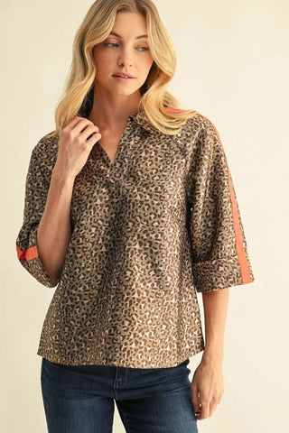 Laurel Leopard Top – leopard print split-neck top with elbow sleeves and coral accents