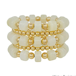 white and gold oval chunky beaded set of 5 stretch bracelet water resistant