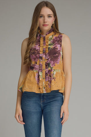Amelia Jane Top – sleeveless mustard top with a purple floral ruffle front and peplum hem