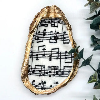 oyster shell trinket dish with sheet music and gold edge