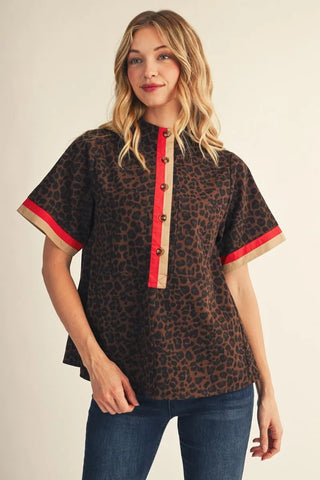 The Bailey Top – brown leopard print top with red and tan contrast placket and sleeve trim, short sleeves