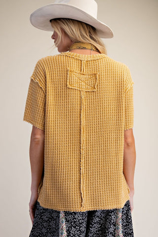 Collin Mustard Mineral Wash Top – mustard waffle-knit top with short sleeves and a chest pocket