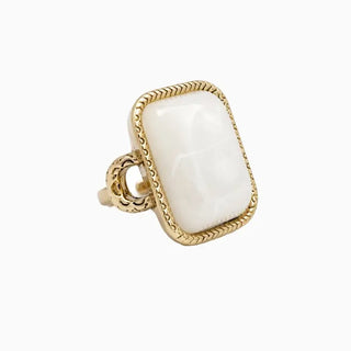 Ivory rectangular stone statement ring in a textured gold-tone frame