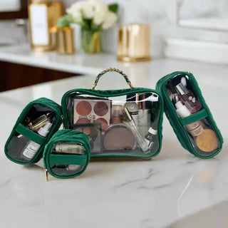 set of three emerald velvet and clear travel pouches