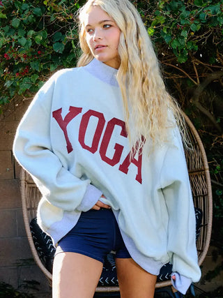 Pilates & Yoga Sweatshirt – light blue oversized sweatshirt with maroon YOGA lettering, crew neck