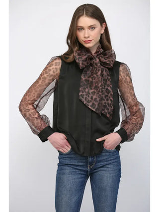 The Hattie Leopard Top – black blouse with sheer leopard print sleeves and oversized leopard bow tie neck