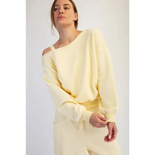 Amanda Sue French Terry Off Shoulder Top – pale butter yellow off-shoulder French terry top with long sleeves
