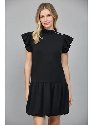 Adelaide Faith Dress – black mini dress with flutter sleeves and a drop waist ruffle hem