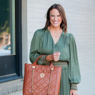 Kinzley Tote Saddle LD – saddle croc-embossed tote with top handles and gold hardware