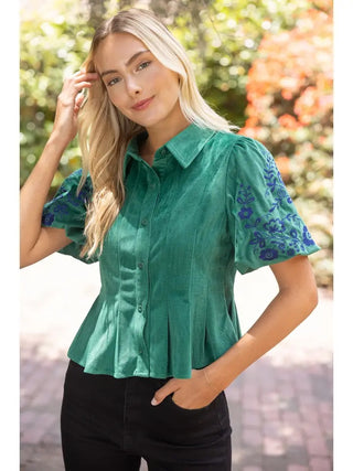 Amy Jo Green Floral Embroidered Button Down Pleated Top – green button-down with blue floral embroidered puff sleeves and a pleated peplum