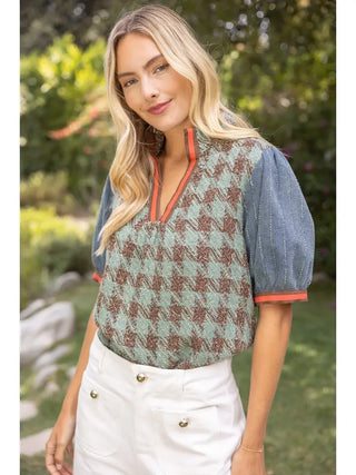 The Caroline Sage Houndstoth Tweed Top – sage and brown houndstooth top with chambray puff sleeves, orange trim V neck