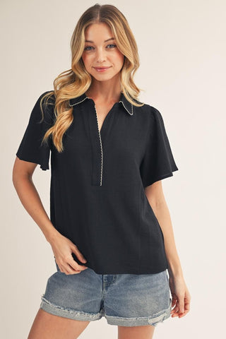 The Claire Top – black collared top, half zip front, short flutter sleeves