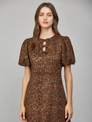 April Lynn Faux Suede Leopard Keyhole Dress – brown leopard print faux suede dress with keyhole neckline and puff sleeves