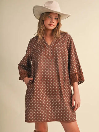 The Harper Brown Dress – brown polka dot shift dress with split neck and 3/4 sleeves