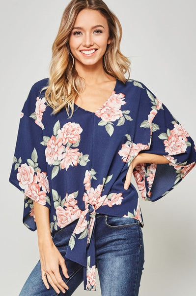 NEVER GETTING OLDER FLORAL TOP